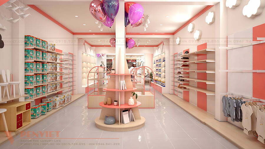 Không gian cửa hàng Bubu Baby nổi bật với gam màu hồng cam và trắng