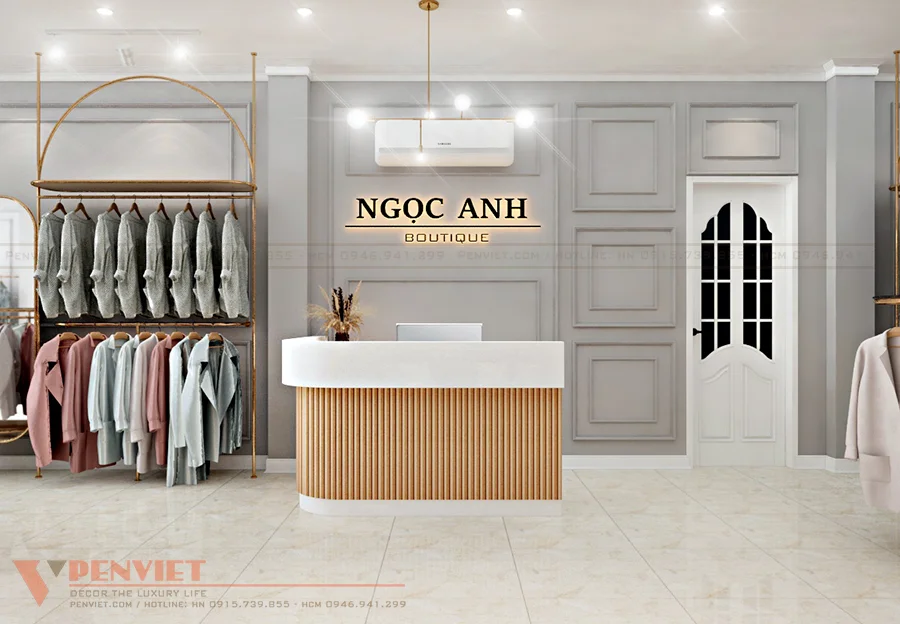 Không gian shop thời trang Ngọc Anh Boutique sang trọng với gam màu xám, trắng chủ đạo